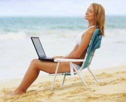 working from home on the beach
